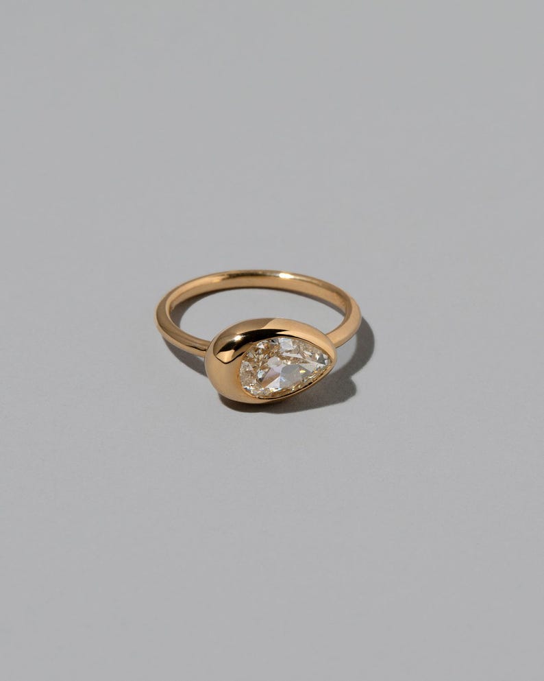 0.75CT-1.25CT Bezel Set Pear Shaped Moissanite Wide Band Engagement Ring