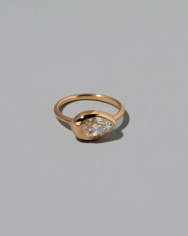 0.75CT-1.25CT Bezel Set Pear Shaped Moissanite Wide Band Engagement Ring