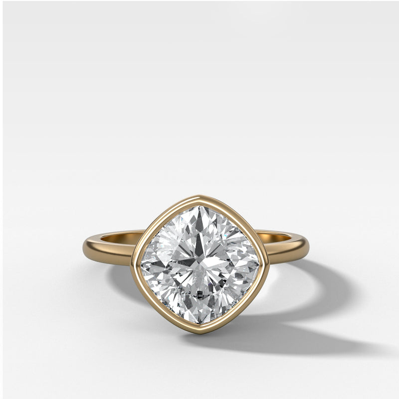 kite-set-cushion-cut-bezel-engagement-ring